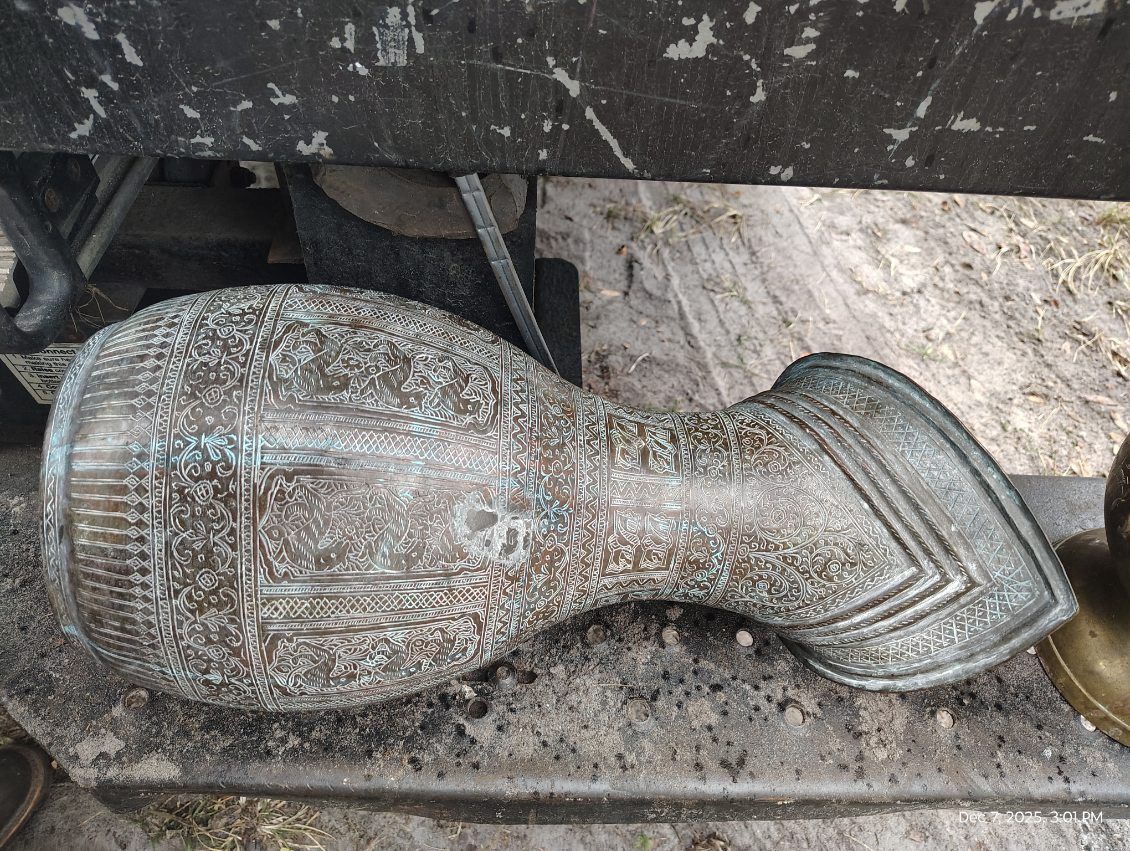 Intricately designed bronze Pitcher with detailed patterns. $100 Located Mount Dora Fla 32757