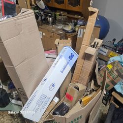 2 boxes of Amazon and box returns, tesla