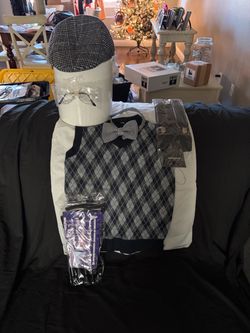Little old man costume includes vest,tie, hat, suspenders, glasses, and cane size5/7 or maybe eight brand new