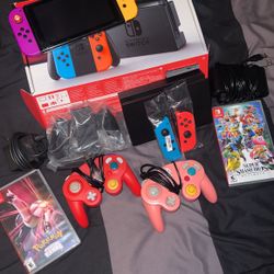 Nintendo Switch With 2 Sets Of Joy Cons , Used Game Cube Controllers x2, Game Cube Controller Adapter , 2 Games 