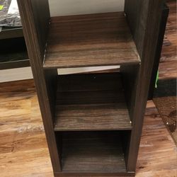 3 shelf solid wood.\nVertical book case