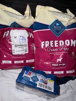 Blue Buffalo Freedom 2x 11lbs bag and 6 can dog food $60