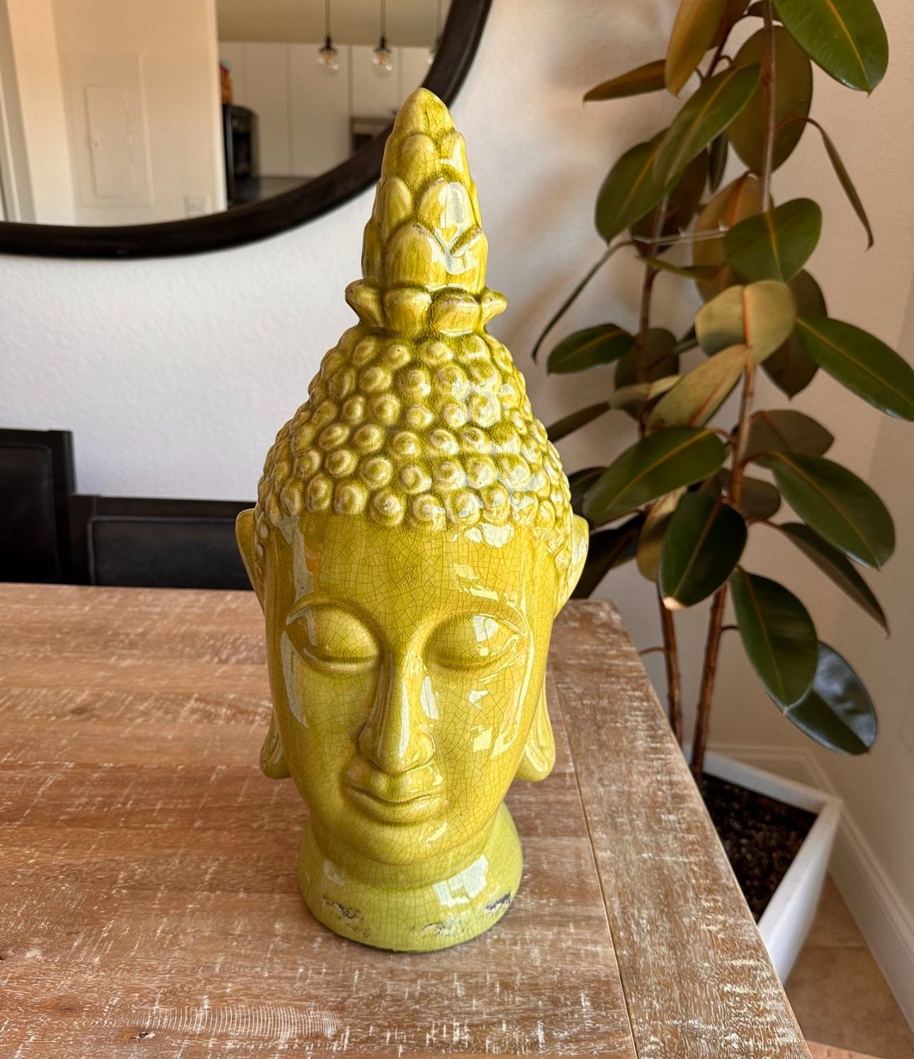 green buddha head