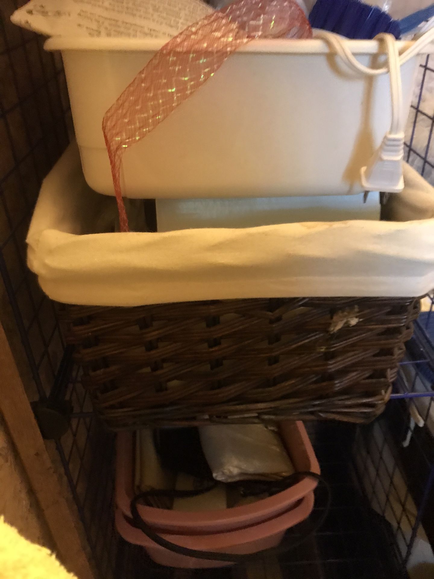 Two dark brown wicker baskets lined