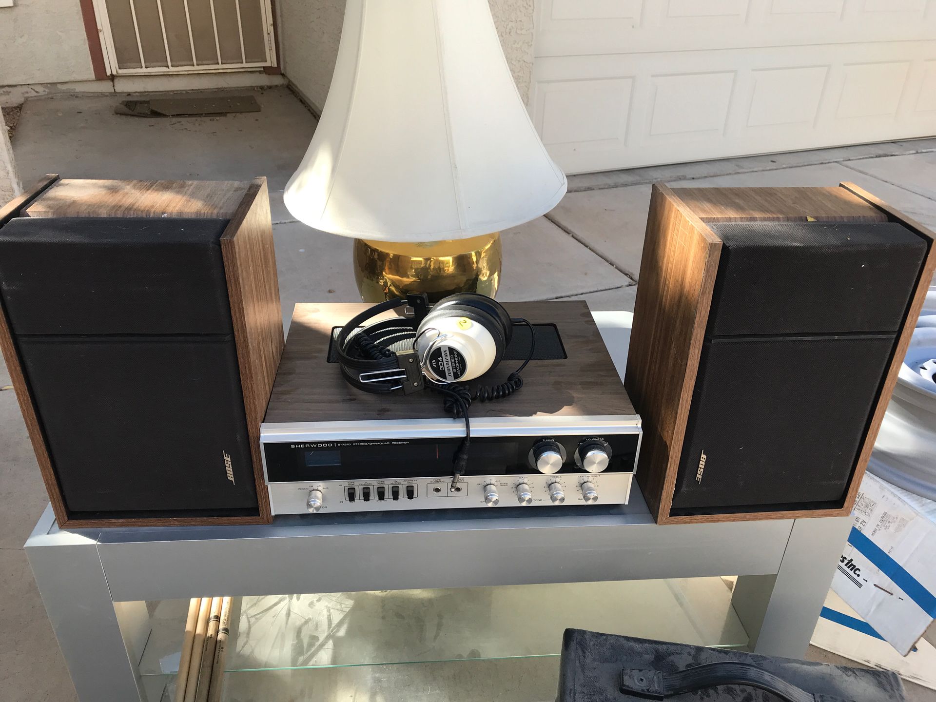 Vintage quadraphonic stereo and two Bose speakers