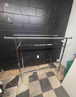 Clothing rack, needs bottom floor levelers and has some weld areas on one side, height adjustable and works excellent, different than one we previousl