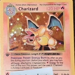 1st Edition Holographic Charizard + Second Edition As Well (Two For One)