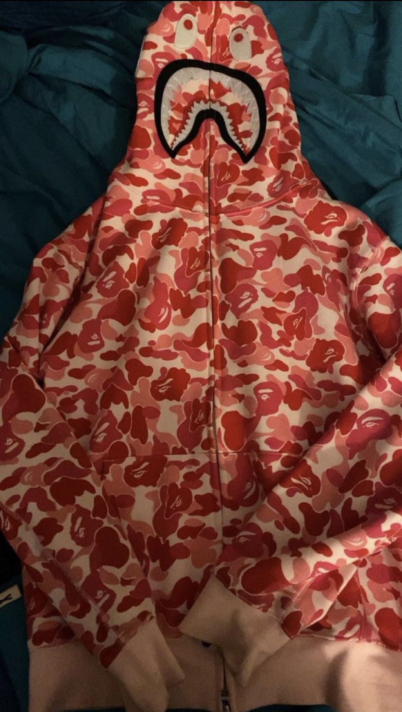 pink bape hoodie size XL but fits like a large 