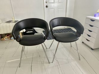 Good condition real leather Chairs set of 2