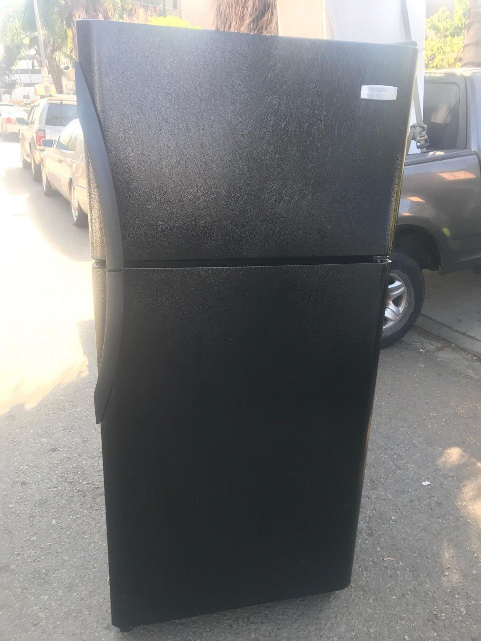 $260 black Frigidaire 18 cubic fridge includes delivering the San Fernando Valley a warranty and installation