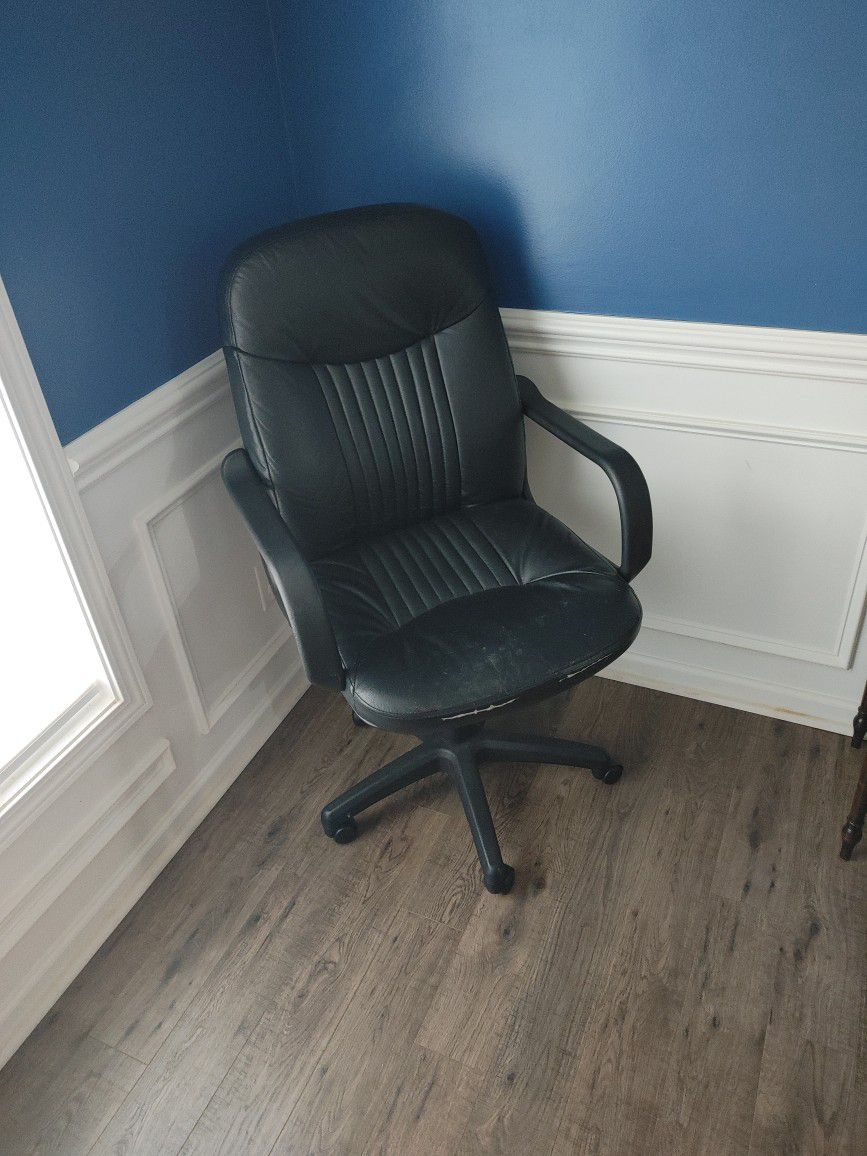 Black rolling office chair with high back & armrests