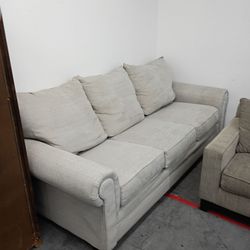 Small beige sofa couch