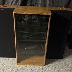 Sony Stereo System, Includes Original Speakers, Record Player, CD And Cassette Player. Some Chipped Areas On Particle Board. Vintage 1980s