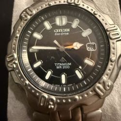 Citizen Eco Drive Men's Titanium Watch Black Dial WR 200 M Luminous Lightweight 