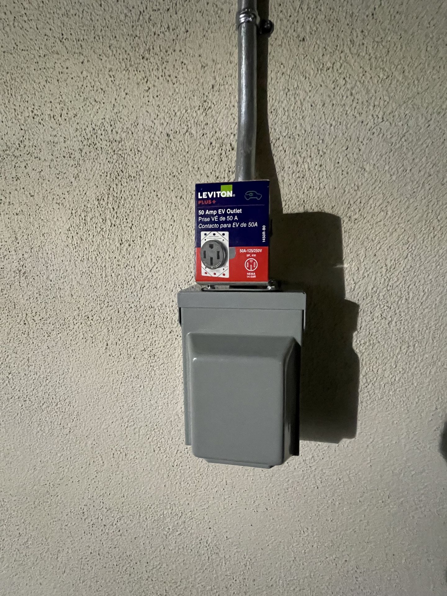 Tesla EV car wall charger nema 1450 level 2 outlet