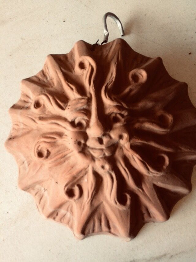 Terra-cotta Sun face