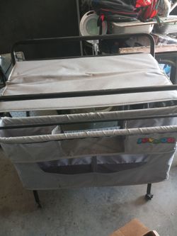 Folding changing station