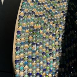 Small designer, coffee table marble shaped different colors very heavy