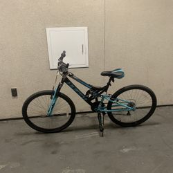 Huffy black blue bike