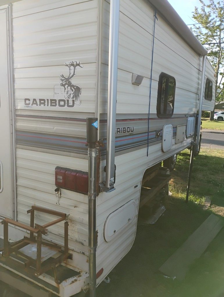91 Caribou Cab Over Camper