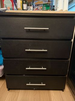 Black 4 drawer dresser with T bar handles