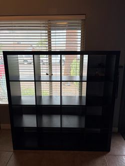 IKEA Kallax shelf unit in brown/black