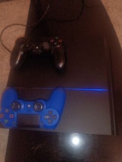 PS4, 2 Controllers, And 14 Game Discs.