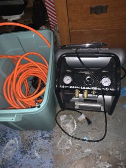Air compressor with hose