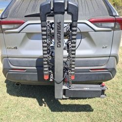 Yakama Fold out bike rack.  fits on a 2 inch hitch. Carries 4 bikes easily.  