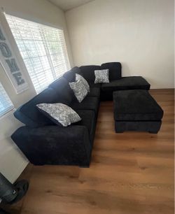 Black Sectional Sofa with Ottoman
