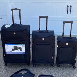 PROTEGE -One-28” 0ne -20” One-15” & two carry handle rolling luggage bags.