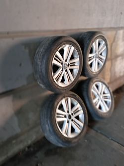 Set of 4 Silver Alloy Wheels with Tires