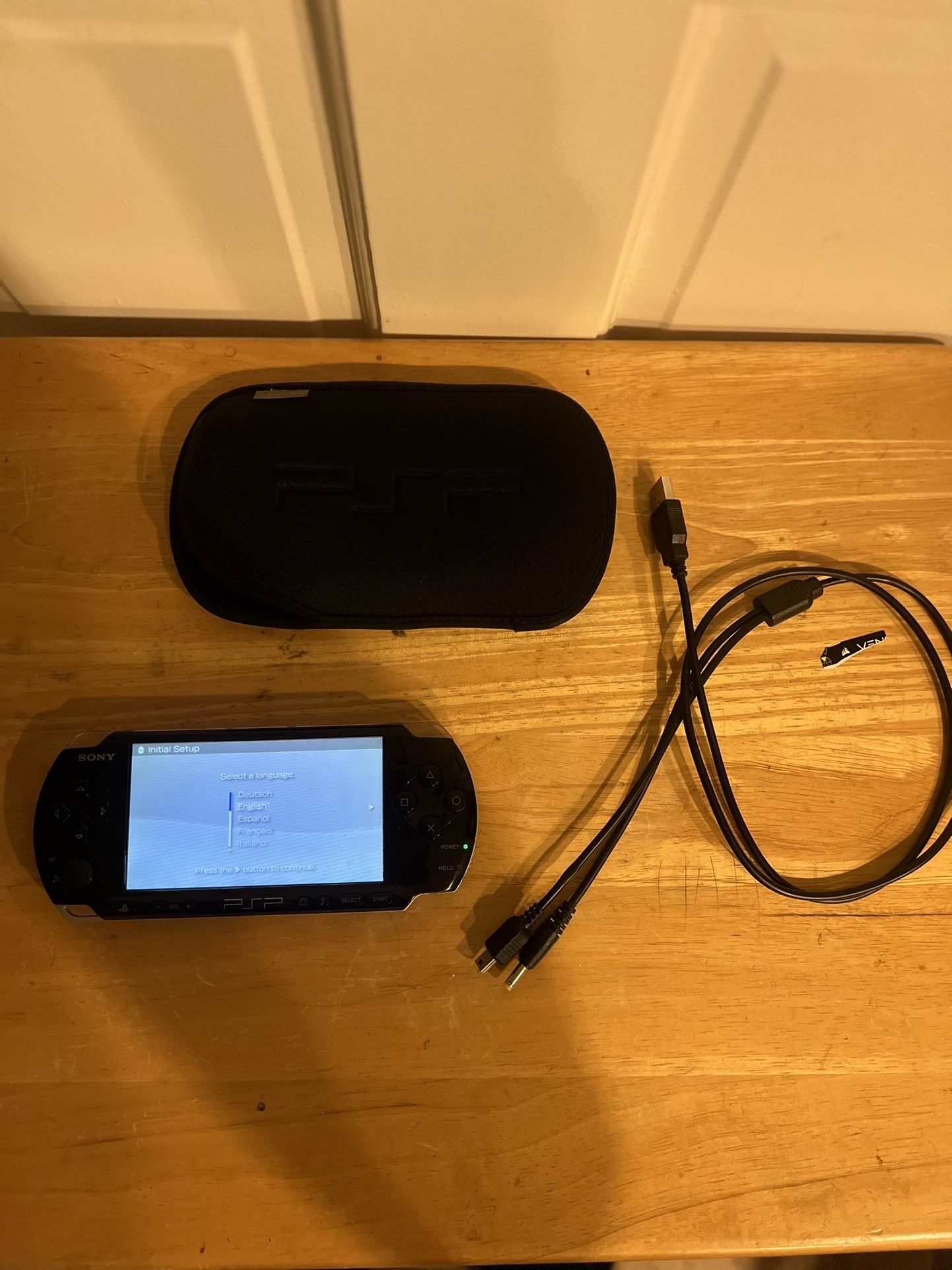 Psp 1000 with Charger And Sleeve