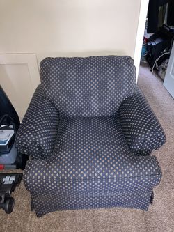 Beautiful Blue Cushioned Chair.