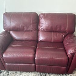 RED LEATHER RECLINING COUCH