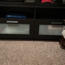 Tv stand with 2 drawers and storage space