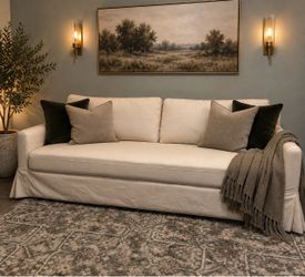Beautiful new open-box slipcover sofa in color Linen.