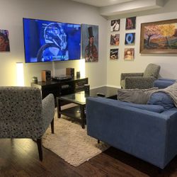 Blue Couch and Two Abstract Arm Chairs 