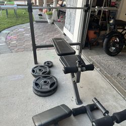 Bench Press Seat, Rack, Bar, Weights, And Extra Attachments 