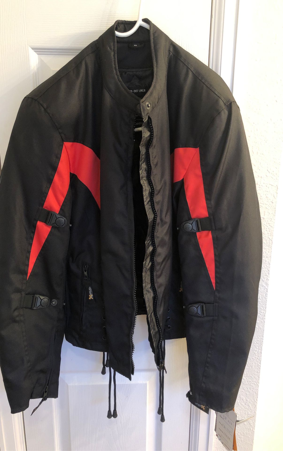 Men’s XL black/red motorcycle jacket, brand new, tags still on.