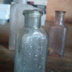 5 Small Pharmaceutical bottles 2 full
