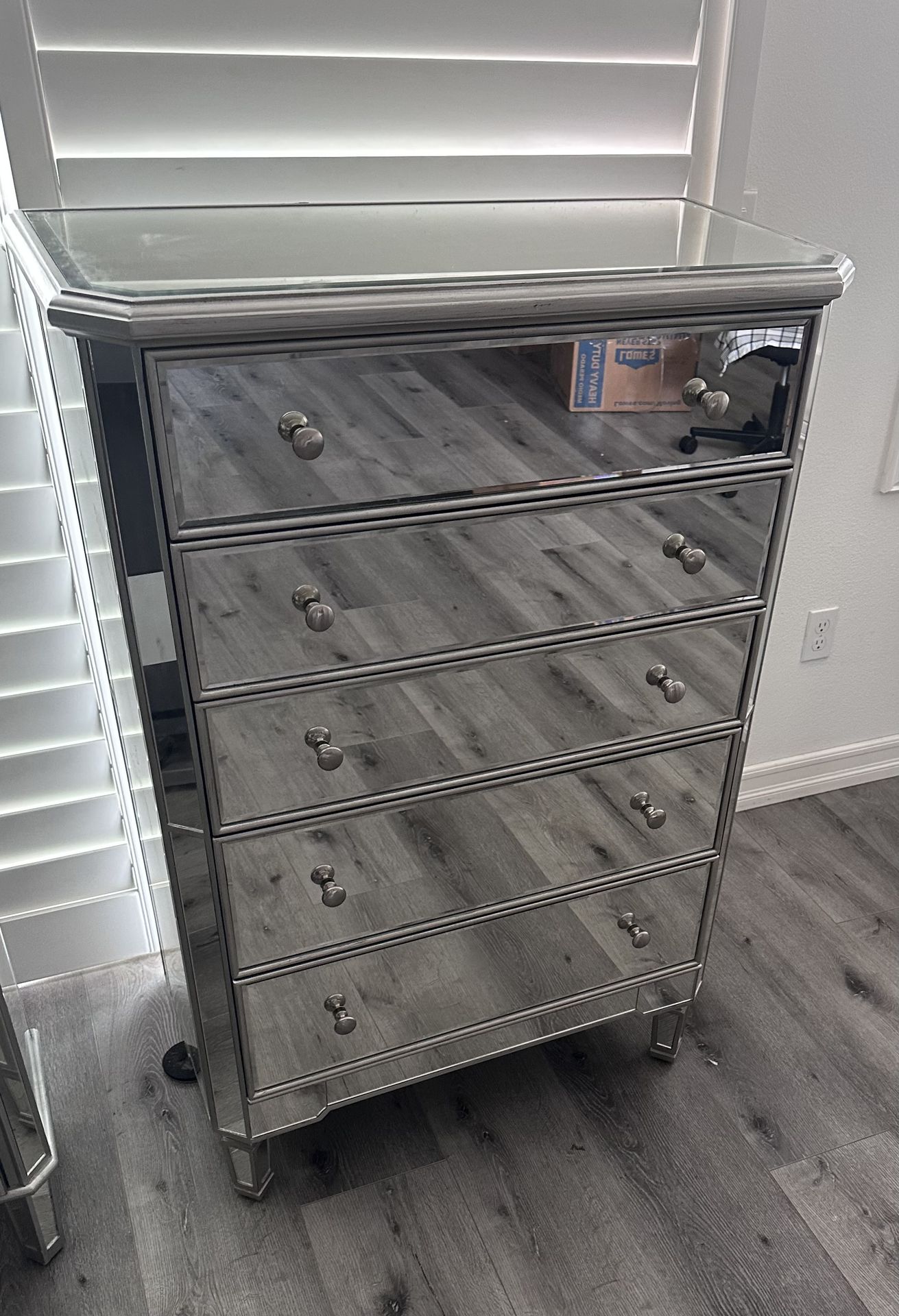 Tall glass / mirrored dresser