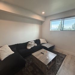 U shaped couch + table