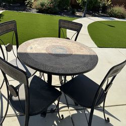 Metal Tiled Patio Table With Four Chairs . 