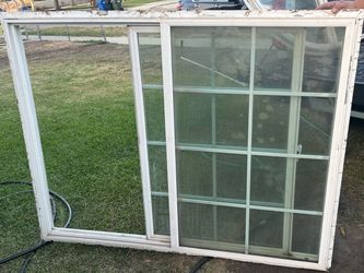 Window with white frame 48” by 59 1/2”