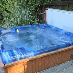 Jacuzzi brand hot tub. 