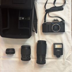 Canon T50 35mm Film Camera Kit – 2 Lenses + Flash + Teleconverter + Bag (Complete Set)