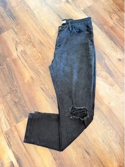 Women’s black distressed ankle skinny jeans