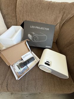 Projector and inflatable screen