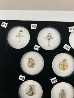 Gold Crosses , Religious Charms and Others Charms.
